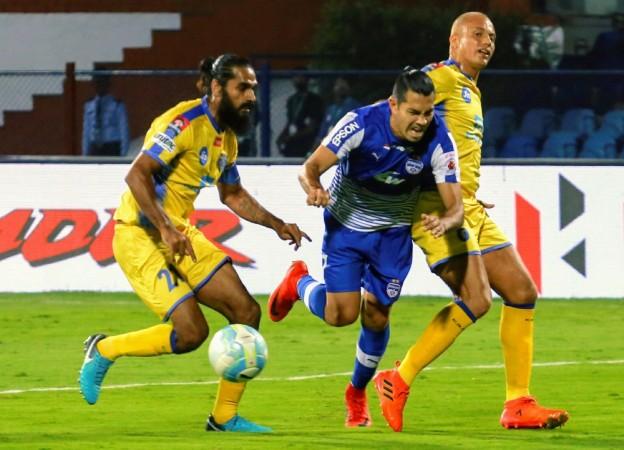 Players in action during an ISL match between Kerala Blasters and Bengaluru FC in Bengaluru, on March 1, 2018. Bengaluru FC vs Kerala Blasters