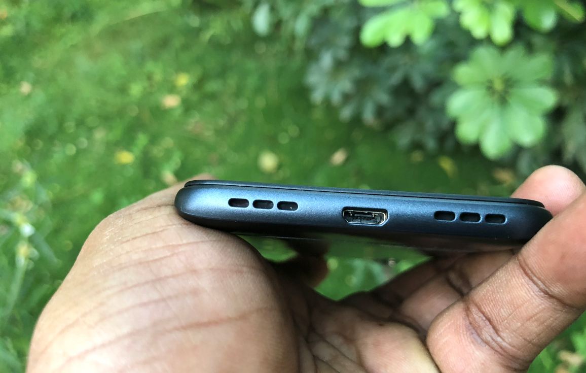Asus Zenfone Lite L1 comes with two speaker grilles at the base with microUSB port in the middle. Asus, Zenfone Lite L1, review, price, specs, India