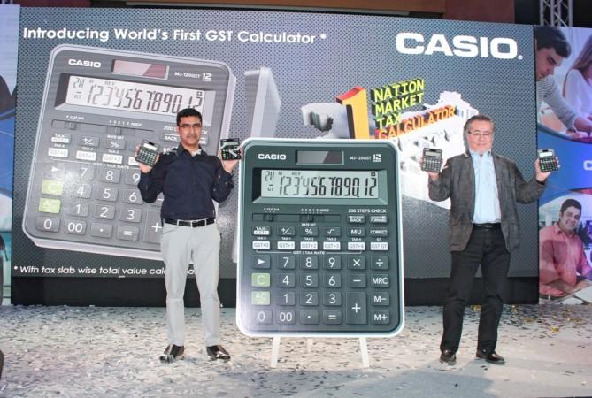 Kulbhushan Seth, VP, Casio India and Yoshiyuki Uehara, MD, Casio India with new calculators Casio GST calculator