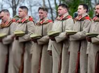 Members of military history clubs wearing WWI Russian military uniforms attend a ceremony marking the centenary of the Armistice Day at the Brotherly cemetery of WWI heroes in Tsarskoye Selo outside Saint Petersburg on November, 11, 2018.