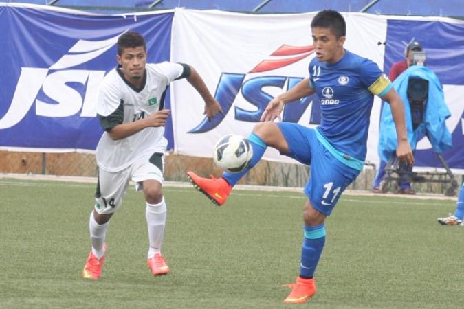 Indian football captain Sunil Chhetri in action during a friendly football match against Pakistan at Bangalore Football Stadium on Aug 20, 2014 Indian Football Team
