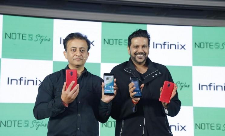 Infinix Note 5 Stylus Android One launched in India. From left-- Anish Kapoor, CEO Infinix Mobile India, along with Rocky Star. Infinix, Note 5 Stylus, Android One, India, launch, price