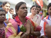 ndian transgender political candidate Chandramukhi Muvvala (C), 32, greets voters as she campaigns in the Goshamahal constituency in Hyderabad on November 26, 2018. - Chandramukhi is contesting the Telangana Assembly elections, which is taking place on De