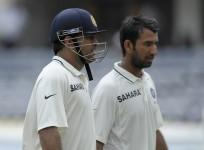 Pujara Dhoni