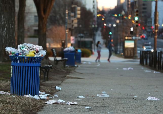 Trash builds up along the National Mall as trash collectors are off work during a partial shutdown of the federal government US govt shutdown