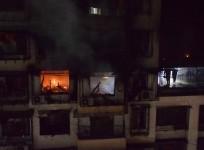 Indian fire fighters work to control a fire on a 14th floor of a residential building in Mumbai, on December 27, 2018