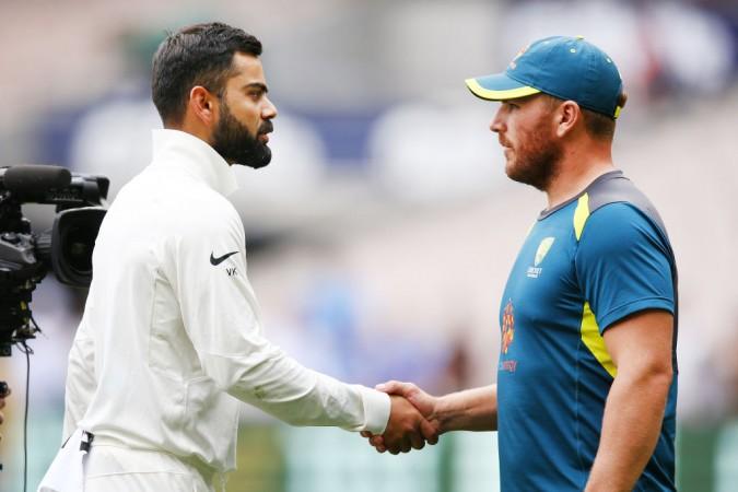 Virat Kohli shaking hands with Aaron Finch after the Melbourne Test match. Virat Kohli Aaron Finch
