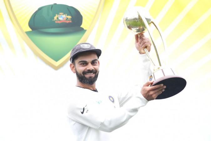 Virat Kohli with the Border-Gavaskar trophy Virat Kohli India Cricket team