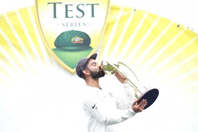 Virat Kohli kissing the Border-Gavaskar trophy after becoming the first captain to win a Test series in Australia. Virat Kohli India Cricket team