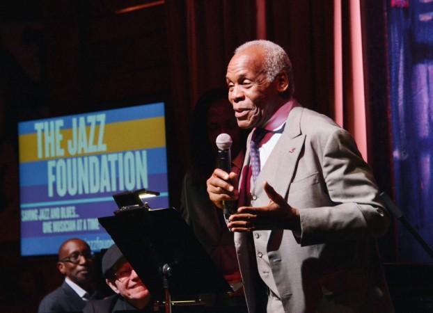 Actor Danny Glover speaks onstage as Quincy Jones hosts Jazz Foundation LA Fundraiser Danny Glover