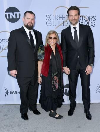 Bradley Cooper (R) and Gloria Campano(M) attend the SAG awards Gloria Campano