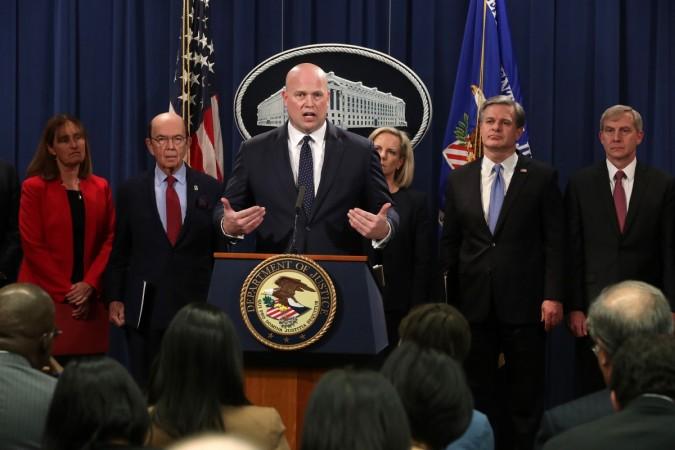 US announces new criminal charges against Chinese telecommunications giant Huawei at the Department of Justice January 28, 2019 in Washington, DC. Huawei indictment