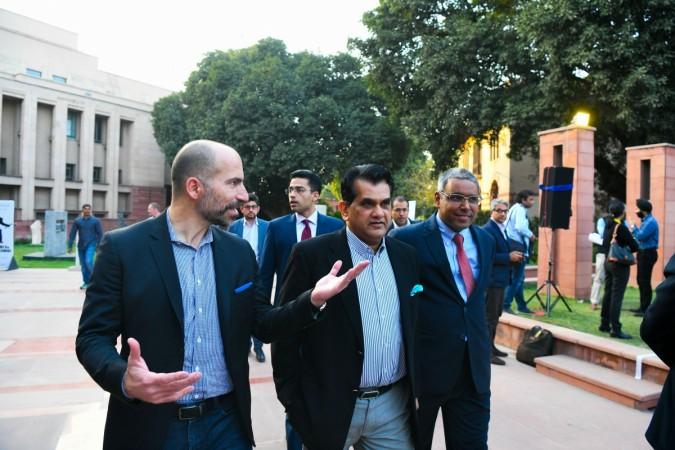 Chief Executive Officer of Uber Dara Khosrowshahi (left) and NITI Ayog Amitabh Kant (right) arrive at a conference on 'sustainable mobility' hosted by the US-India Strategic Partnership Forum in New Delhi on February 22, 2018. Khosrowshahi's suggestion to Indians not to buy cars could become controversial. NITI Aayog
