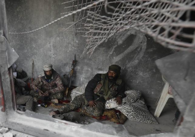 a member of Syria's Arab Shaytat tribe who has joined a Kurdish-led alliance fighting the Islamic State group in northern Syria