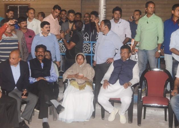 West Bengal Chief Minister Mamata Banerjee at Dharamtala, Kolkata where she is staging a sit-in demonstration on Feb 3, 2019. This comes after an evening of high drama in front of Kolkata police commissioner Rajeev Kumar's official residence on Loudon Street when a group of CBI officers were stopped by city police personnel from approaching Kumar's house. Mamata Banerjee at Dharamtala