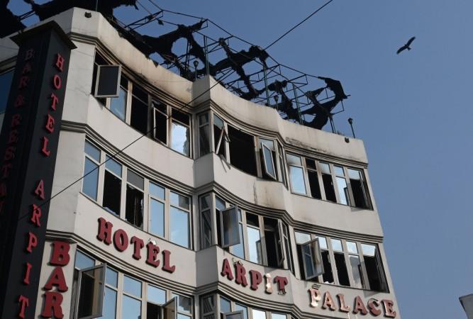 A general view shows the Hotel Arpit Palace after a fire broke out on its premises in New Delhi on February 12, 2019. - At least 17 people died on February 12 as a fire tore through the budget hotel in Delhi before dawn, in the latest disaster to raise concerns over fire safety in India. A general view shows the Hotel Arpit Palace after a fire broke out on its premises in New Delhi on February 12, 2019.