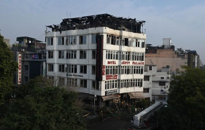 A general view shows the Hotel Arpit Palace after a fire broke out on its premises in New Delhi on February 12, 2019. - At least 17 people died on February 12 as a fire tore through the budget hotel in Delhi before dawn, in the latest disaster to raise concerns over fire safety in India. A general view shows the Hotel Arpit Palace after a fire broke out on its premises in New Delhi on February 12, 2019.