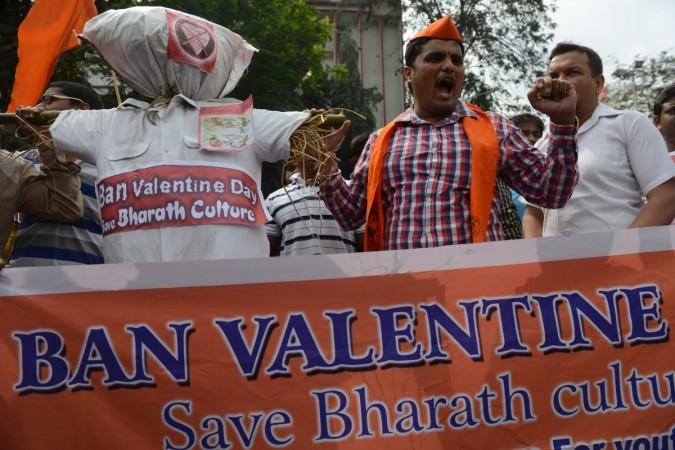 Indian activists of the youth-wing Hindu organisation the Bajrang Dal carry an effigy representing Valentine's Day as they shout slogans in Hyderabad on February 14, 2014. The Bajrang Dal youth-wing hindu group strongly oppose Valentine's day celebrations citing them as cultural invasion on the Hindu way of life. Indian activists of the youth-wing Hindu organisation the Bajrang Dal carry an effigy representing Valentine's Day as they shout slogans in Hyderabad on February 14, 2014.