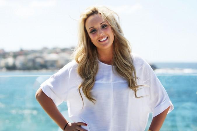 Charlotte Letitia Crosby of UK reality TV series, Geordie Shore, poses for a photo at Bondi Beach. Charlotte Crosby