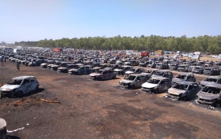Over 300 cars gutted in the parking lot of Yelahanka air base Aero India gutted cars
