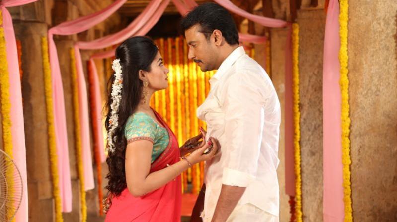 Rashmika Mandanna and Darshan in Yajamana. Darshan and Rashmika Mandanna in Yajamana