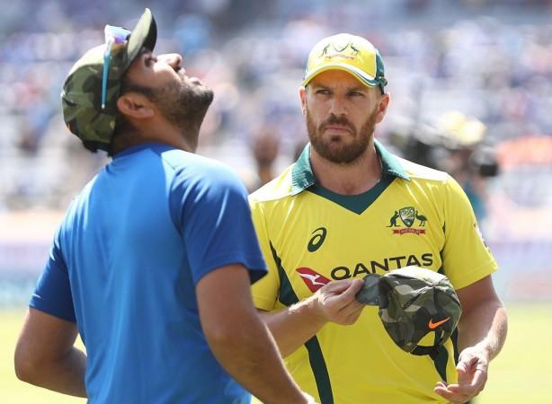 Aussie skipper Aaron Finch with Rohit Sharma. Aaron Finch