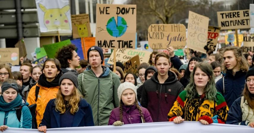Swedish climate activist Greta Thunberg (C) takes part in a demonstration of students calling for climate protection on March 1, 2019 in front of the cityhall in Hambourg, Germany. Greta Thunberg