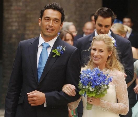 Lady Davina Windsor (2nd L) walks arm in arm with her newly wed husband, Gary Lewis, outside the chapel at Kensington Palace. Lady Davina Windsor and Gary Lewis