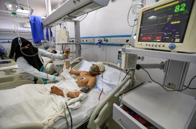 EDITORS NOTE: Graphic content / A Yemeni boy lies in a hospital bed as he receives treatment in the Huthi-rebel-held capital Sanaa on March 11, 2019, from wounds sustained during a reported air strike in the Kisar district of the northern Hajjah province. Yemeni boy lies in a hospital bed