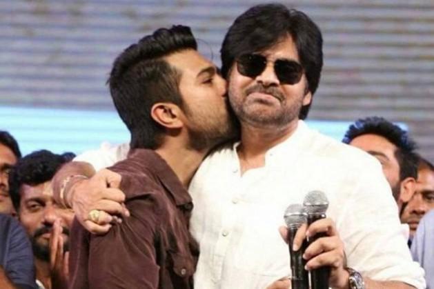 Ram Charan kissing Pawan Kalyan Ram Charan kissing Pawan Kalyan