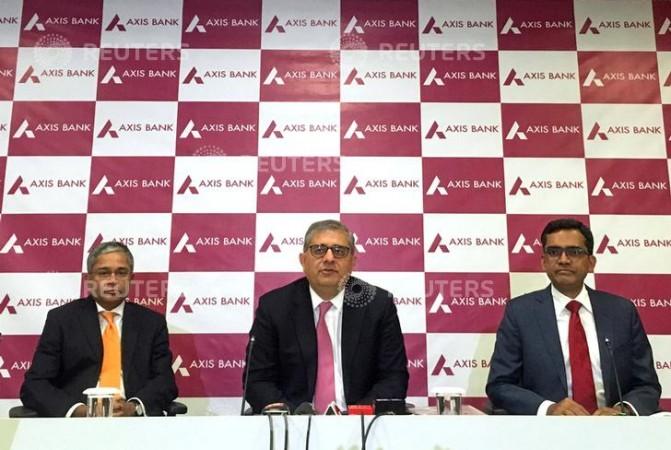 Axis Bank CEO, Amitabh Chaudhry sitting in the middle Axis Bank CEO, Amitabh Chaudhry