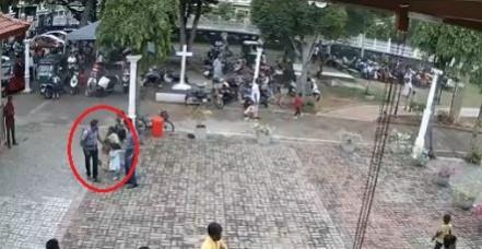 suicide bomber patting girl's head