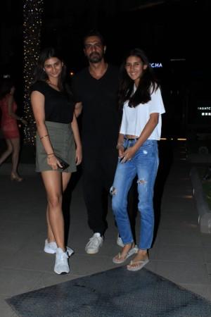 Arjun Rampal with daughters - Mahikaa and Myra post their dinner outing last night in Mumbai Arjun Rampal with daughters - Mahikaa and Myra