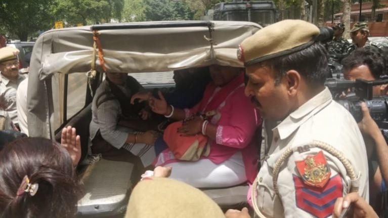 Delhi Police detains protesters. Delhi Police detains protesters