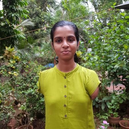 Born without hands, Devika faced life as a challenge to come out successfully clearing her SSLC exams with A . Devika