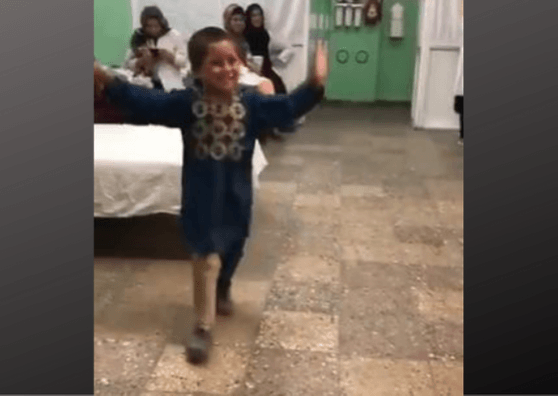 afghan boy dancing