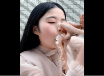 octopus stuck on woman's face