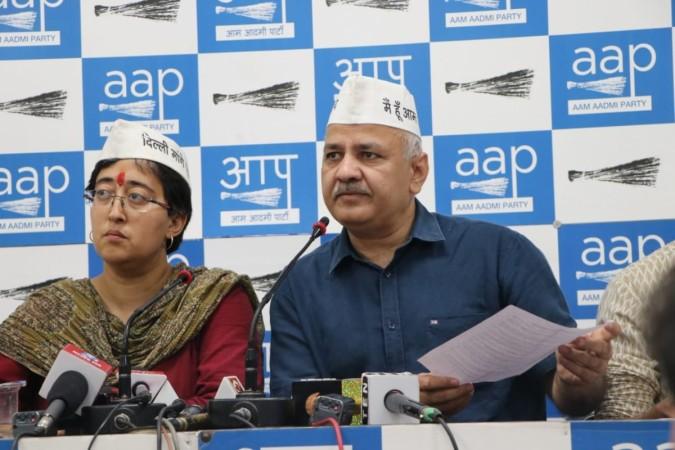 Atishi with Deputy CM Manish Sisodia at the AAP press conference Atishi with Deputy CM Manish Sisodia at the AAP press conference