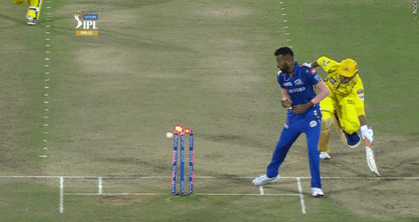 This angle clearly shows the bails being broken before Dhoni makes his crease Dhoni run out