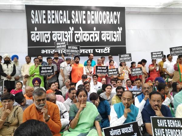 BJP leaders hold a protest against violence in Amit Shah's roadshow in Kolkata. Bengal violence