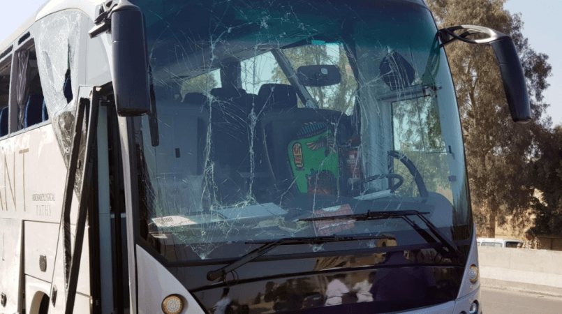 Pictures posted on social media showed a bus with some of its windows blown out or shattered, and debris in the road next to a low wall with a hole in it. giza blast