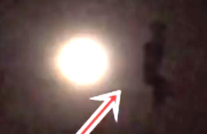 Human figure near moon