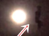 Human figure near moon