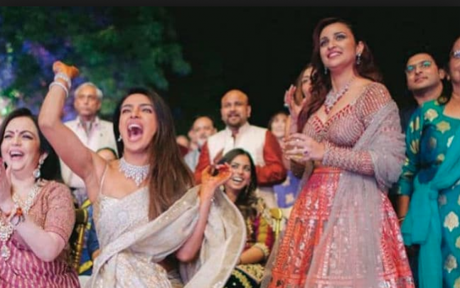 Priyanka Chopra at her wedding sangeet seen with Parineeti Chopra, Nita Ambani and Isha Ambani. Priyanka Chopra at her wedding sangeet seen with Parineeti Chopra, Nita Ambani and Isha Ambani