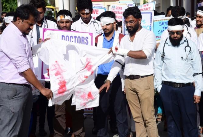 Doctors of Indian Medical Association (IMA) Karnataka, wearing bandages stage a demonstration against the brutal assault on fellow medicos of West Bengal and press for adequate protection for their counterparts, in Bengaluru on June 14, 2019. doctors on strike