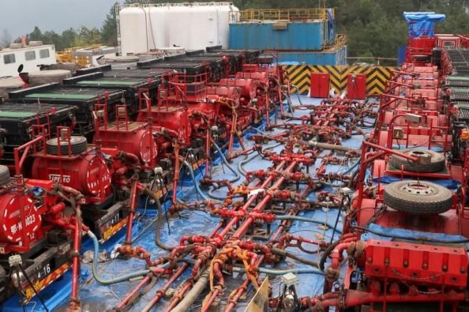 Fracking trucks at work are seen at a shale gas well of Sinopec in Nanchuan. China fracking