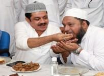 IMA director Mansoor Khan with Minister BZ Zameer Ahmed in an iftaar party.