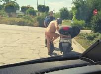 Nude scooter rider