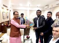Sagar Nama receiving honours from former MP CM Shivraj Singh Chauhan