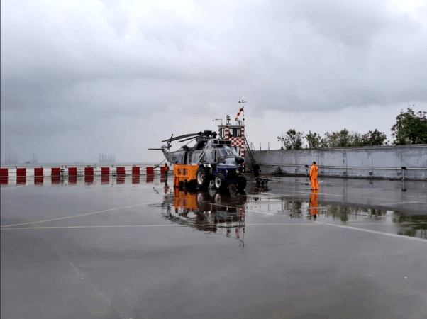 A helicopter has also been sent with divers. indian navy